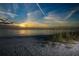 Beautiful sunset along the shoreline, ideal for a tranquil evening walk at 210 Santa Maria St # 244, Venice, FL 34285