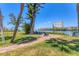 A relaxing view of the waterfront, with chairs to sit and watch boats sailing by at 210 Santa Maria St # 244, Venice, FL 34285