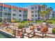 Waterfront seating area with a fire pit offers stunning views of boats and the waterfront at 210 Santa Maria St # 244, Venice, FL 34285
