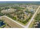 Picturesque property featuring a tranquil pond and mature trees at 21616 67Th E Ave, Bradenton, FL 34211