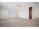 Large bedroom featuring hardwood floors, large windows, and built in shelves at 21616 67Th E Ave, Bradenton, FL 34211