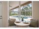 Cozy breakfast nook offers views of the pool and backyard at 21616 67Th E Ave, Bradenton, FL 34211