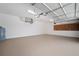 Spacious garage with ample lighting, pegboard, and painted floors at 21616 67Th E Ave, Bradenton, FL 34211