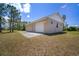 Exterior view of the detached garage, showcasing its clean design and neutral color palette at 21616 67Th E Ave, Bradenton, FL 34211