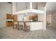 Bright, airy kitchen with breakfast bar and view to the living area at 21616 67Th E Ave, Bradenton, FL 34211