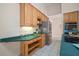 Kitchen with stainless steel appliances and a large center island at 21616 67Th E Ave, Bradenton, FL 34211