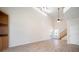 A spacious living room features light wood floors, high ceilings and ample natural light at 21616 67Th E Ave, Bradenton, FL 34211