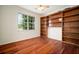 Office space with wood built-in shelving and hardwood floors at 21616 67Th E Ave, Bradenton, FL 34211