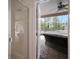 Walk in shower with a view of screened porch and pool at 21616 67Th E Ave, Bradenton, FL 34211