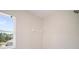 Bright tiled shower with view of the landscape through window at 21616 67Th E Ave, Bradenton, FL 34211