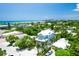 Stunning aerial view of beach house with ocean views at 221 Grant Dr, Sarasota, FL 34236