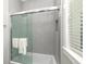 Elegant bathroom features modern shower with tile detail at 221 Grant Dr, Sarasota, FL 34236