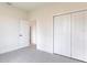 Spacious bedroom with double closet doors and access to an ensuite bathroom at 2231 Hagoplan Ln, North Port, FL 34288