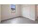 Bedroom with a closet and a view of the exterior at 2231 Hagoplan Ln, North Port, FL 34288