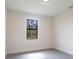 Bedroom with tile flooring and a window view at 2231 Hagoplan Ln, North Port, FL 34288