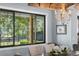 Dining room area with large window view of the outdoors at 25305 83Rd E Ave, Myakka City, FL 34251