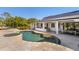 Wonderful exterior of a home with pool and patio with outdoor bar at 25305 83Rd E Ave, Myakka City, FL 34251