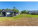 RV parked between the main house and the storage building on the property at 25305 83Rd E Ave, Myakka City, FL 34251