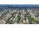 Neighborhood aerial view featuring lush greenery and glimpses of pools in a picturesque residential setting at 2932 Upper Tangelo Dr, Sarasota, FL 34239