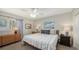 Comfortable bedroom with carpet, great natural light from the windows, and minimalist decorations at 2932 Upper Tangelo Dr, Sarasota, FL 34239