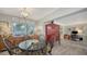 Comfortable dining area with a window view and furniture perfect for Gathering meals and entertaining guests at 2932 Upper Tangelo Dr, Sarasota, FL 34239