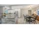 A bright kitchen with stainless appliances, granite countertops, and a kitchen table, great for everyday meals at 2932 Upper Tangelo Dr, Sarasota, FL 34239