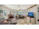 Inviting living area with natural light, comfortable seating, and stylish accents at 2932 Upper Tangelo Dr, Sarasota, FL 34239