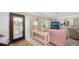 Comfortable living room with modern decor, lots of light, and tile flooring at 2932 Upper Tangelo Dr, Sarasota, FL 34239