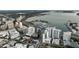 Stunning aerial view of the city showcasing the coastline, marina, and luxurious high-rise buildings at 301 Quay Commons # 503, Sarasota, FL 34236