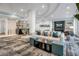 Relaxing living room features modern decor, a large sofa, and a cozy atmosphere at 301 Quay Commons # 503, Sarasota, FL 34236