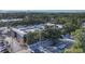 Aerial view of Oasis on Osprey community with mature trees and bay views at 3350 S Osprey Ave # 211A, Sarasota, FL 34239
