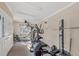 Community fitness center with various exercise machines and free weights for residents' use at 3350 S Osprey Ave # 211A, Sarasota, FL 34239