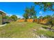 Fenced backyard featuring ample green space, offering privacy and room for recreation at 3427 Cambridge Dr, Sarasota, FL 34232