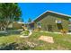 Well-maintained backyard with stone pathway and landscaped garden, great for outdoor entertaining at 3427 Cambridge Dr, Sarasota, FL 34232