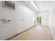 Finished flex space with laminate flooring, window AC, and ample electrical at 3427 Cambridge Dr, Sarasota, FL 34232