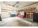 Spacious garage with lighting and storage potential at 3427 Cambridge Dr, Sarasota, FL 34232