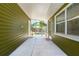 Covered back patio with a view of the fenced backyard at 3427 Cambridge Dr, Sarasota, FL 34232