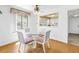 Dining room with glass top table at 3500 El Conquistador Pkwy # 117, Bradenton, FL 34210