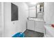 Bright laundry room with a washer and dryer, and additional storage space at 3500 El Conquistador Pkwy # 117, Bradenton, FL 34210
