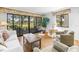 Bright living room with golf course views at 3500 El Conquistador Pkwy # 117, Bradenton, FL 34210