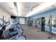 Bright and airy gym featuring state-of-the-art cardio equipment and weight machines at 3803 Savanna Palms Ct, Bradenton, FL 34211