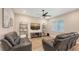 Comfortable living room with modern furniture, a ceiling fan, and neutral paint color at 3803 Savanna Palms Ct, Bradenton, FL 34211