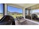 Screened patio with a table and seating at 3803 Savanna Palms Ct, Bradenton, FL 34211