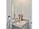 Bathroom featuring granite countertop vanity and modern fixtures at 3813 Lively Coral Pl, Bradenton, FL 34208