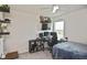 Bedroom includes carpeted floors, ceiling fan and dedicated gaming space with wall decor and natural light at 3813 Lively Coral Pl, Bradenton, FL 34208