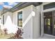 Open front door view with modern design and neutral color palette at 3836 Wenona Dr, North Port, FL 34288