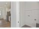 View of the kitchen adjacent to the laundry room at 3836 Wenona Dr, North Port, FL 34288