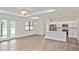 Open floor plan with modern kitchen featuring a center island at 3836 Wenona Dr, North Port, FL 34288