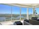 Breathtaking balcony with stunning waterfront views, perfect for relaxing and entertaining guests at 385 N Point Rd # 903, Osprey, FL 34229