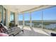 Inviting balcony with ample space for outdoor seating, providing stunning views of the surrounding scenery at 385 N Point Rd # 903, Osprey, FL 34229